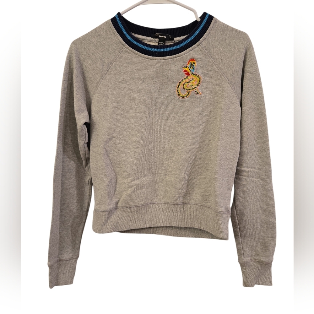 DIESEL DOUBLE SIDED SNAKE AND GRAPHIC PRINT ON THE BACK. SIZE SMALL. RUNS SMALL.